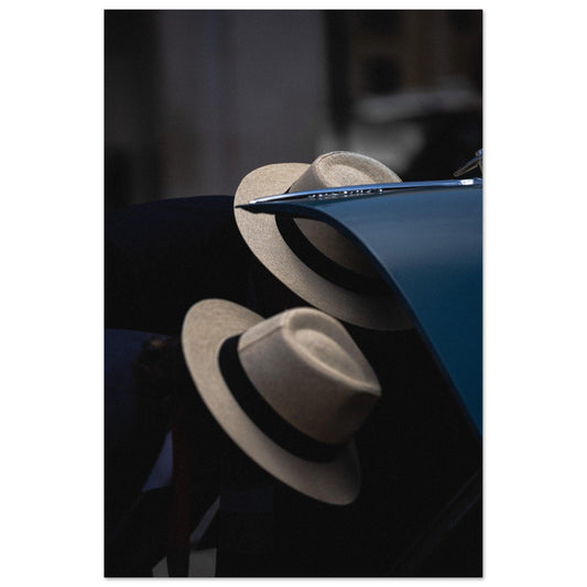 Witness two suave figures, hats donned, engrossed in analyzing at the Retro Car Event in Malta on 50x75 cm metal poster - Linked Frame